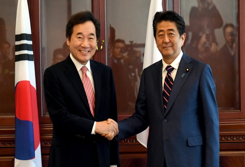 PM meets with Abe