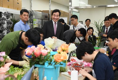 PM visits company employing disabled people